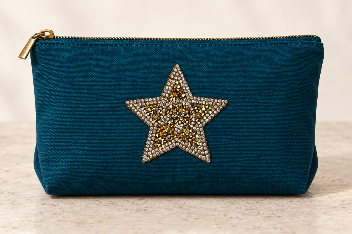 Gouden ster strass patch op een petrolkleurige etuitas