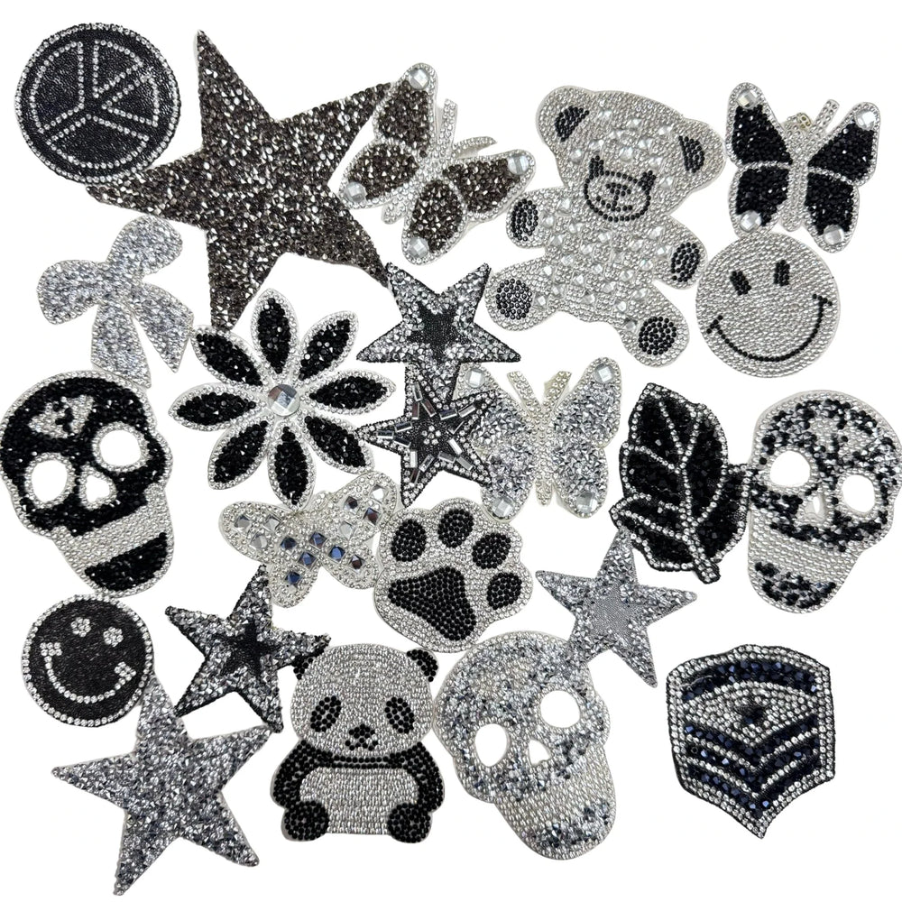 Verschillende zwarte en zilveren strass patches uit de Fasola-collectie