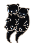 Twee zwarte otters, voorzijde