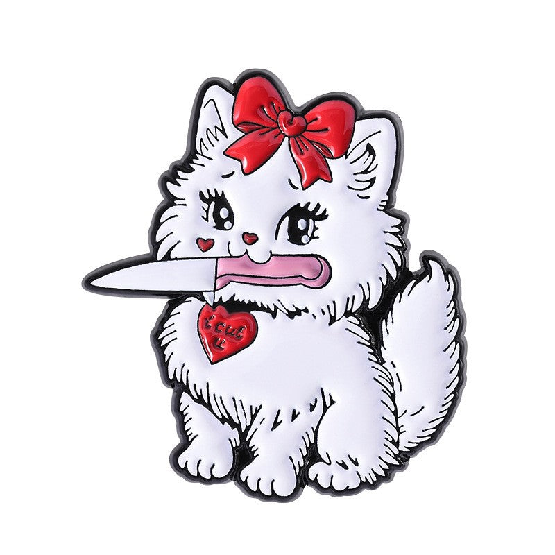 P6-17-witte-kitten-met-rode-strik-en-een-mes-pin