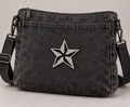 Ster met zwarte twist strass patch van 8,5 × 8,5 cm op een zwarte tas