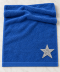 Middelgrote zilveren ster strass patch op een blauwe handdoek – SP0043