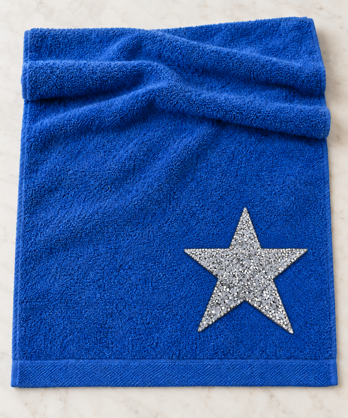 Grote zilveren ster strass patch op een blauwe handdoek – SP0044